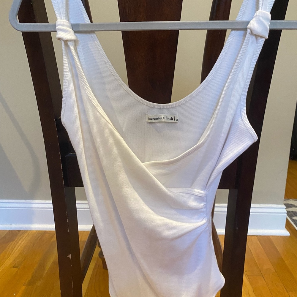 White Abercrombie and Fitch body suit. Size medium.
